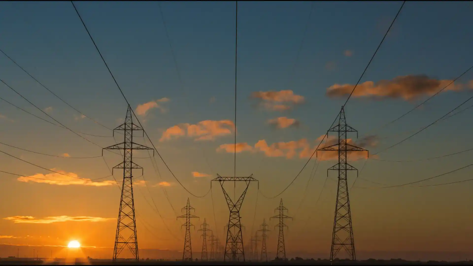 An Image of Powerlines at Sunset
